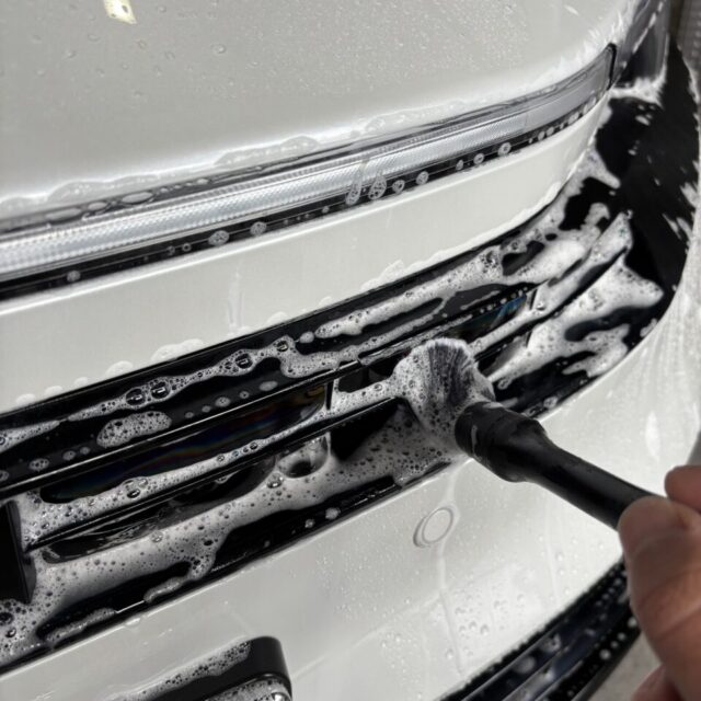 徳島県美馬市からご来店の新車トヨタ アクア（MXPK16）。徳島県三好市カーコーティング専門店SOUPが純水洗浄・鉄粉除去・脱脂処理まで徹底し、G.Guardプラチナ3層コーティングの密着性を最大限に高める下地処理を実施。